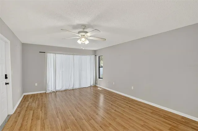 an aerial view of residential house with outdoor space and swimming pool