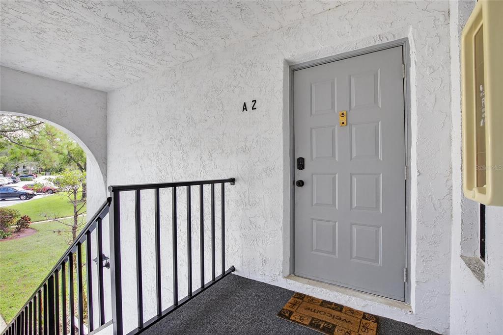 1225 Pine Ridge Circle West, Unit A2 Tarpon Springs, FL 34688 - Photo 10 of 59 a view of a hallway