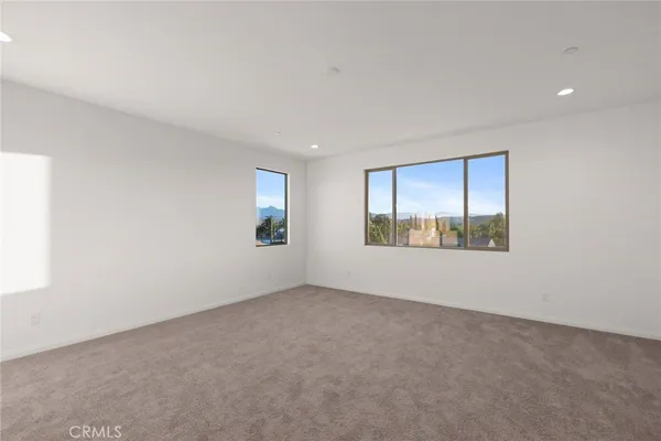 an empty room with windows