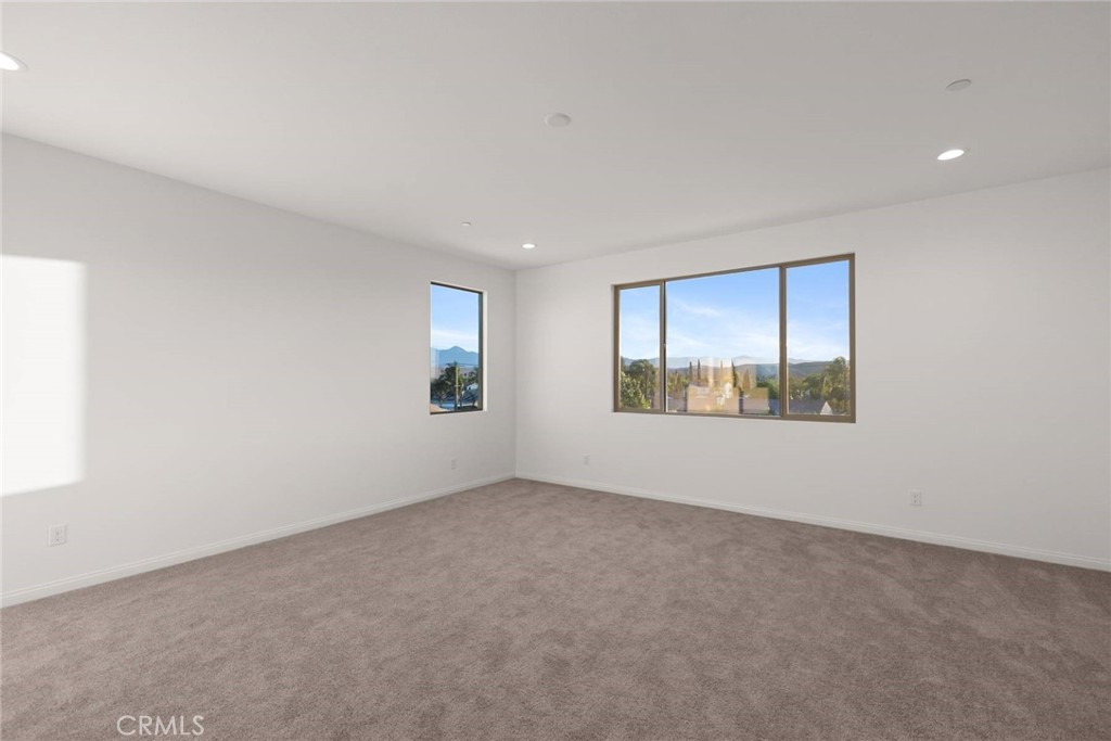 17727 Santa Lucia Court Riverside, CA 92503 - Photo 26 of 42 an empty room with windows