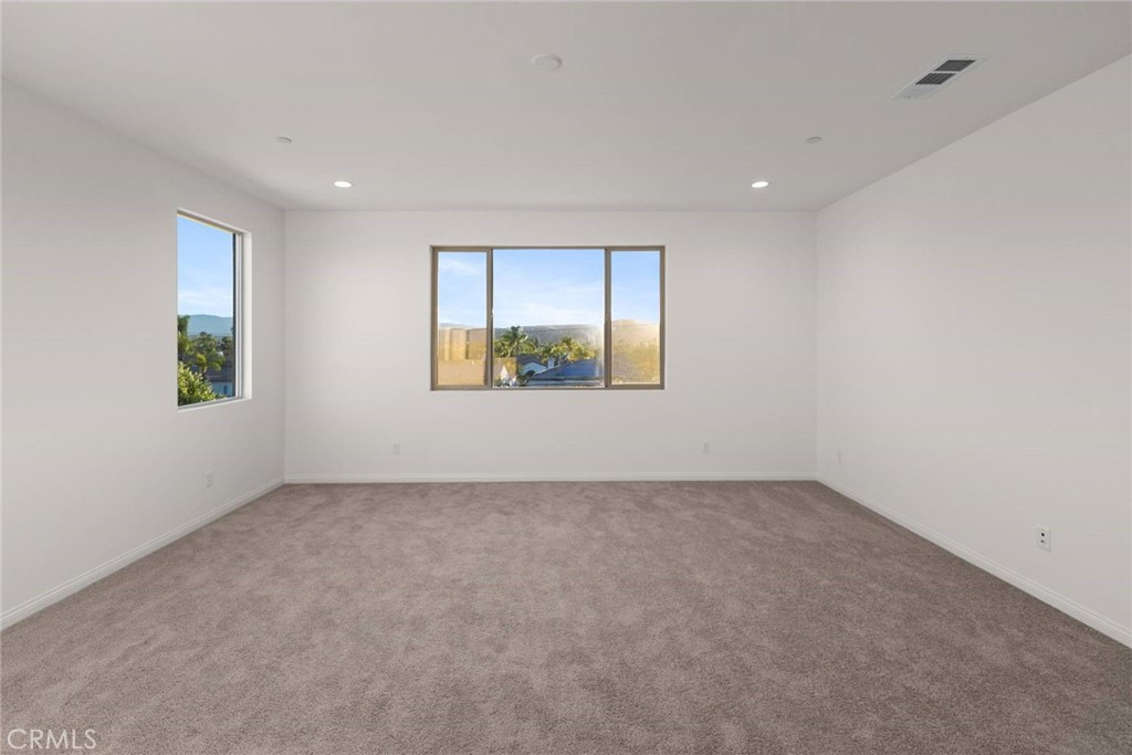 17727 Santa Lucia Court Riverside, CA 92503 - Photo 27 of 42 an empty room with a window
