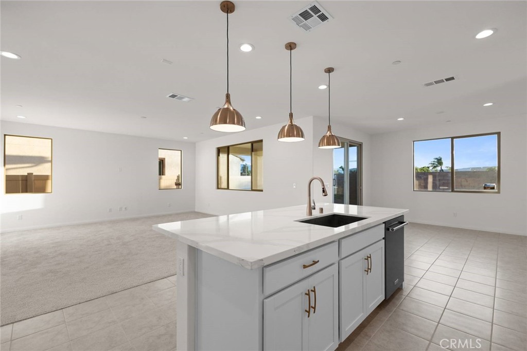 17727 Santa Lucia Court Riverside, CA 92503 - Photo 9 of 42 a kitchen with sink and window