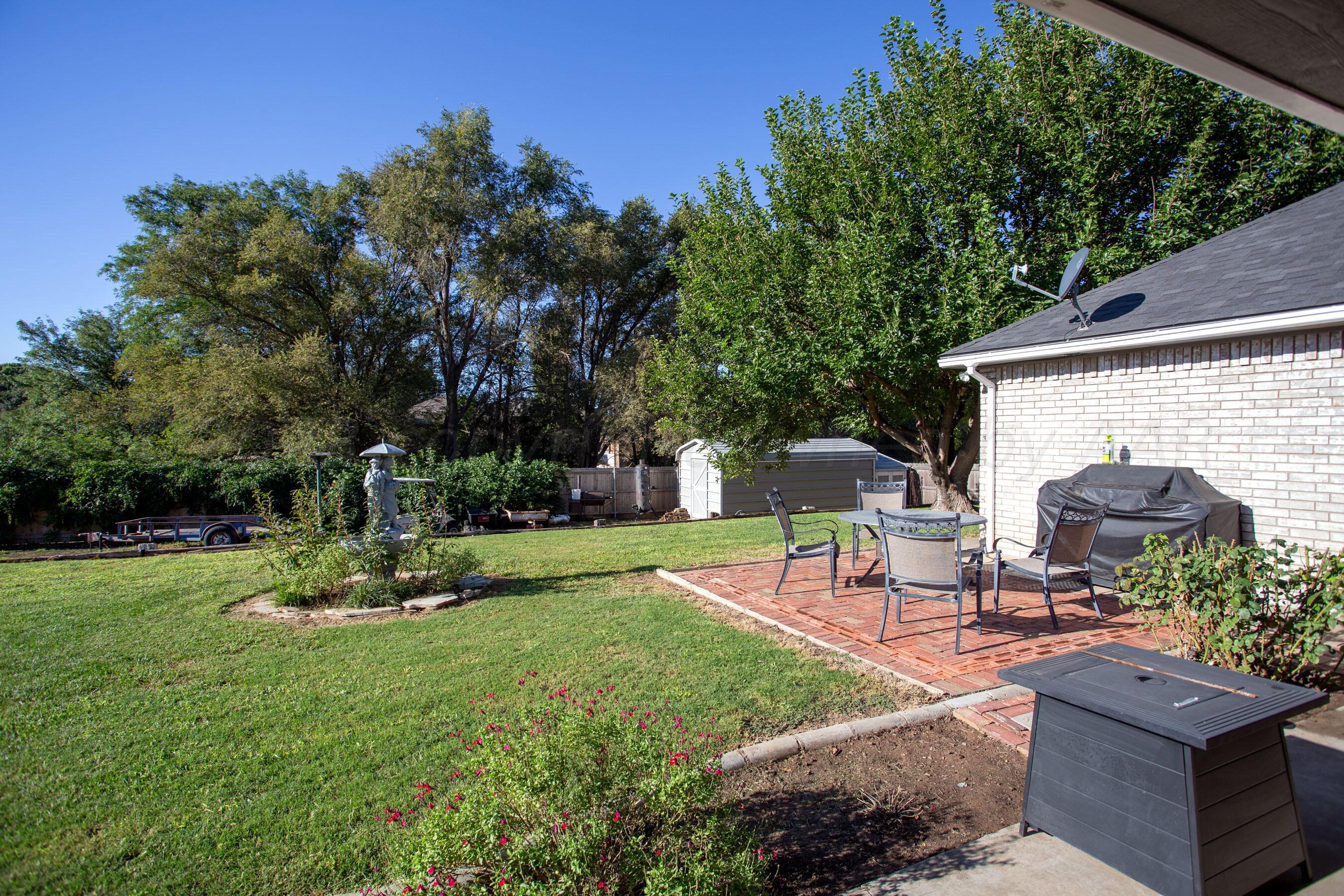 7301 Smoketree Drive Amarillo, TX 79124 - Photo 33 of 37 a view of a backyard with sitting area