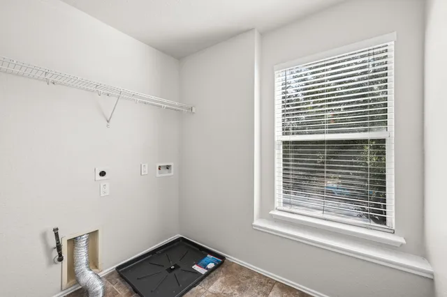 a view of a room that has a window in it