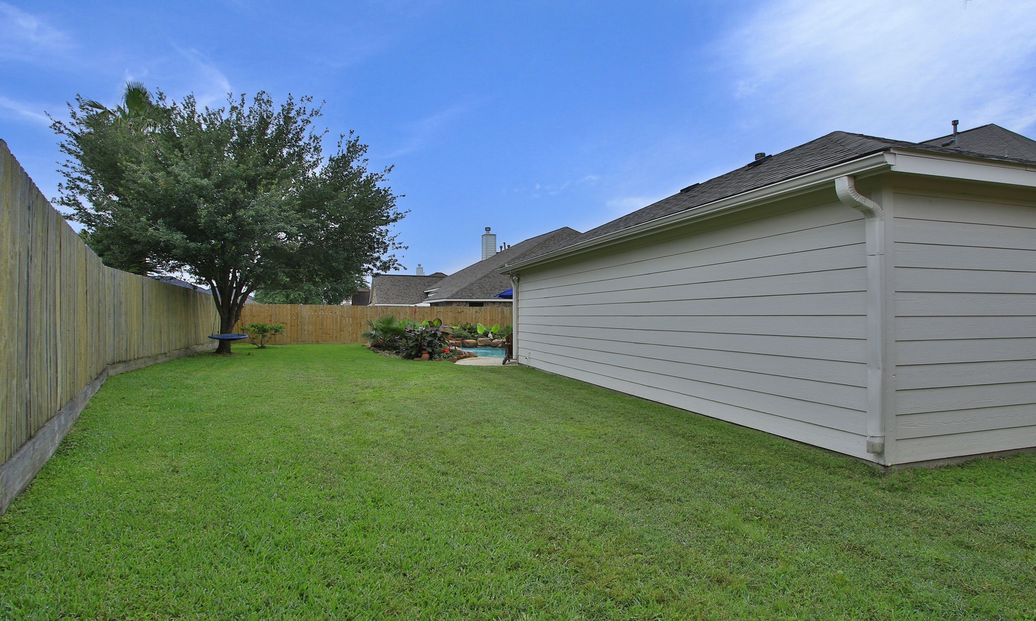 8419 Marchelle Lane Spring, TX 77379 - Photo 33 of 42 a view of a backyard with a garden