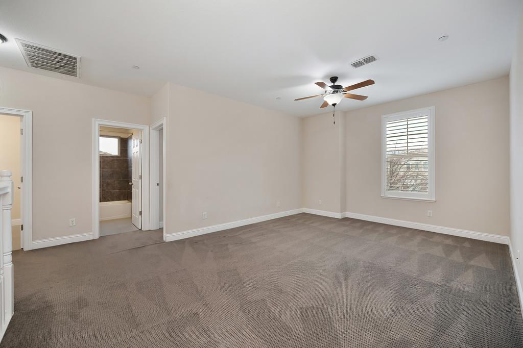 1916 Hartsfield Way Lincoln, CA 95648 - Photo 19 of 35 an empty room with fan and windows