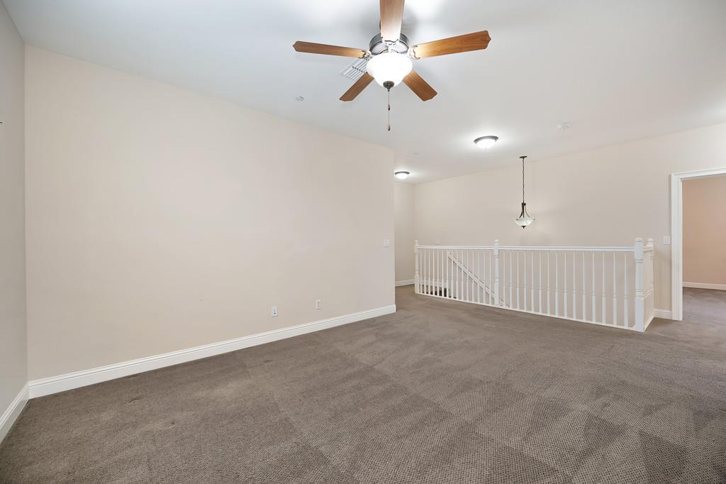 1916 Hartsfield Way Lincoln, CA 95648 - Photo 20 of 35 an empty room with fan and windows