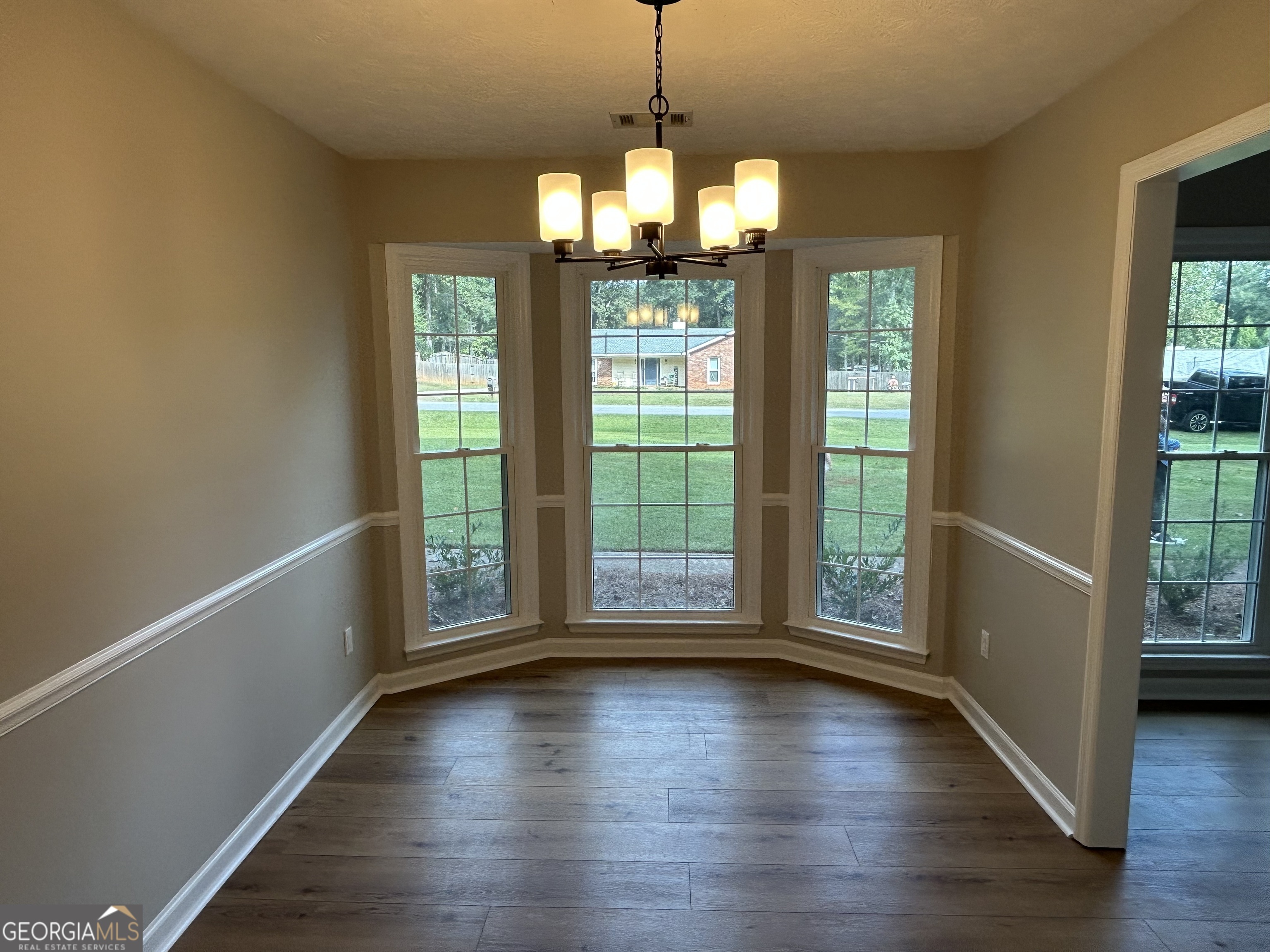 191 Moccasin Trail LaGrange, GA 30241 - Photo 12 of 32 a view of livingroom with hardwood floor and window