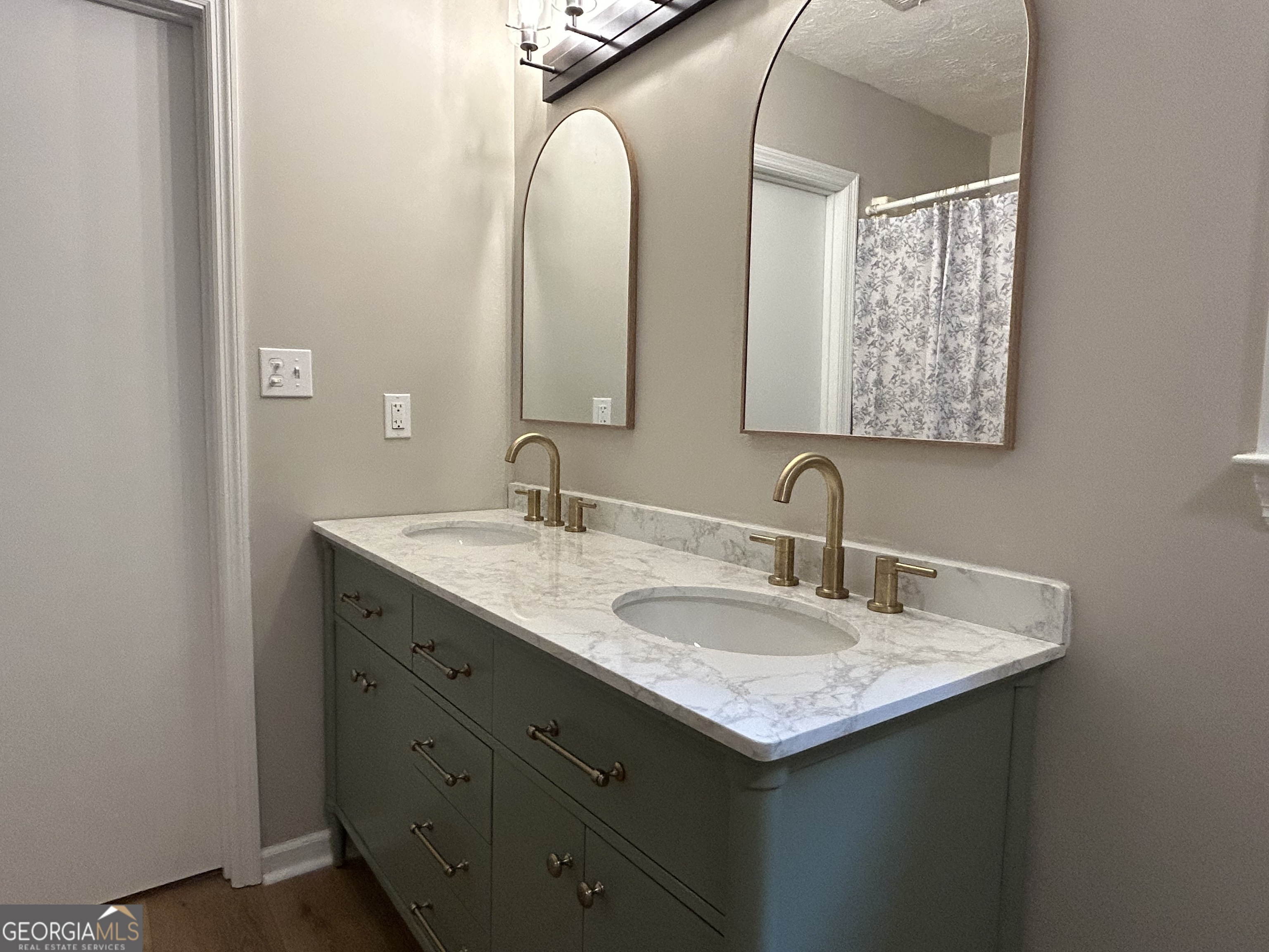 191 Moccasin Trail LaGrange, GA 30241 - Photo 19 of 32 a bathroom with a granite countertop sink and a mirror