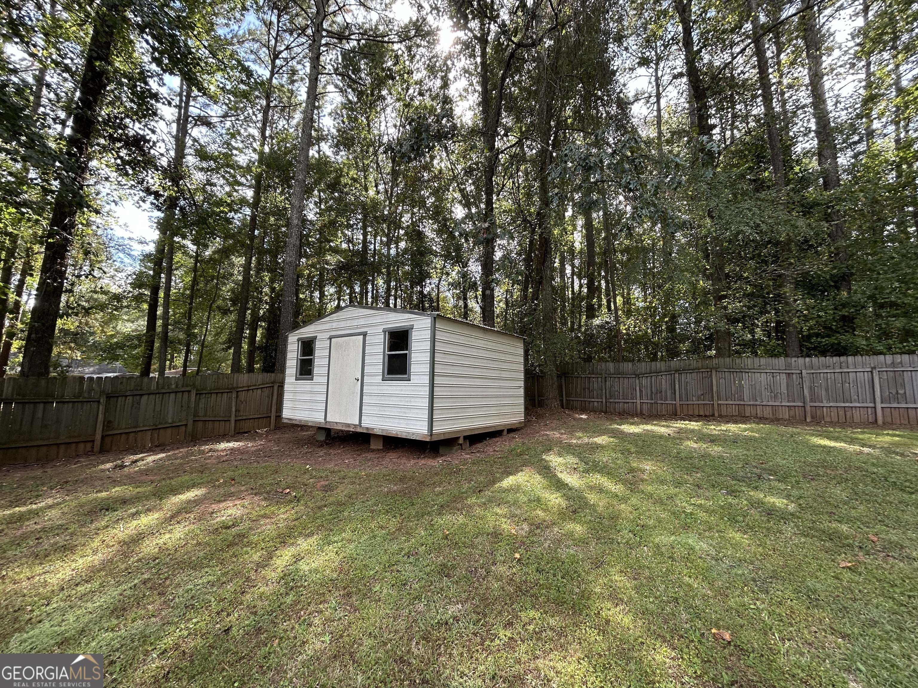 191 Moccasin Trail LaGrange, GA 30241 - Photo 28 of 32 a view of a small space in a backyard