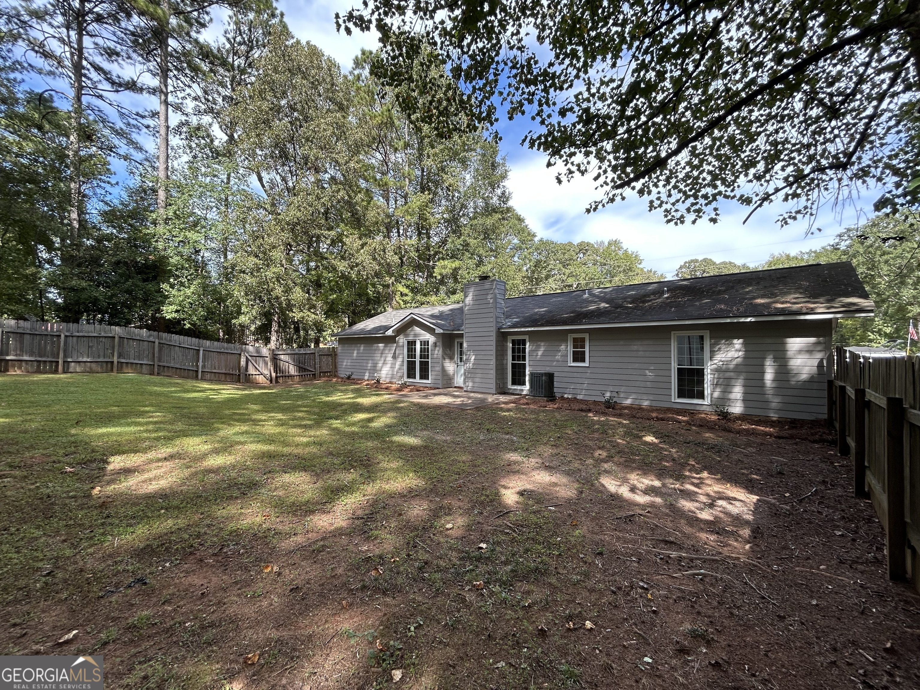 191 Moccasin Trail LaGrange, GA 30241 - Photo 30 of 32 a view of a house with a yard and large tree