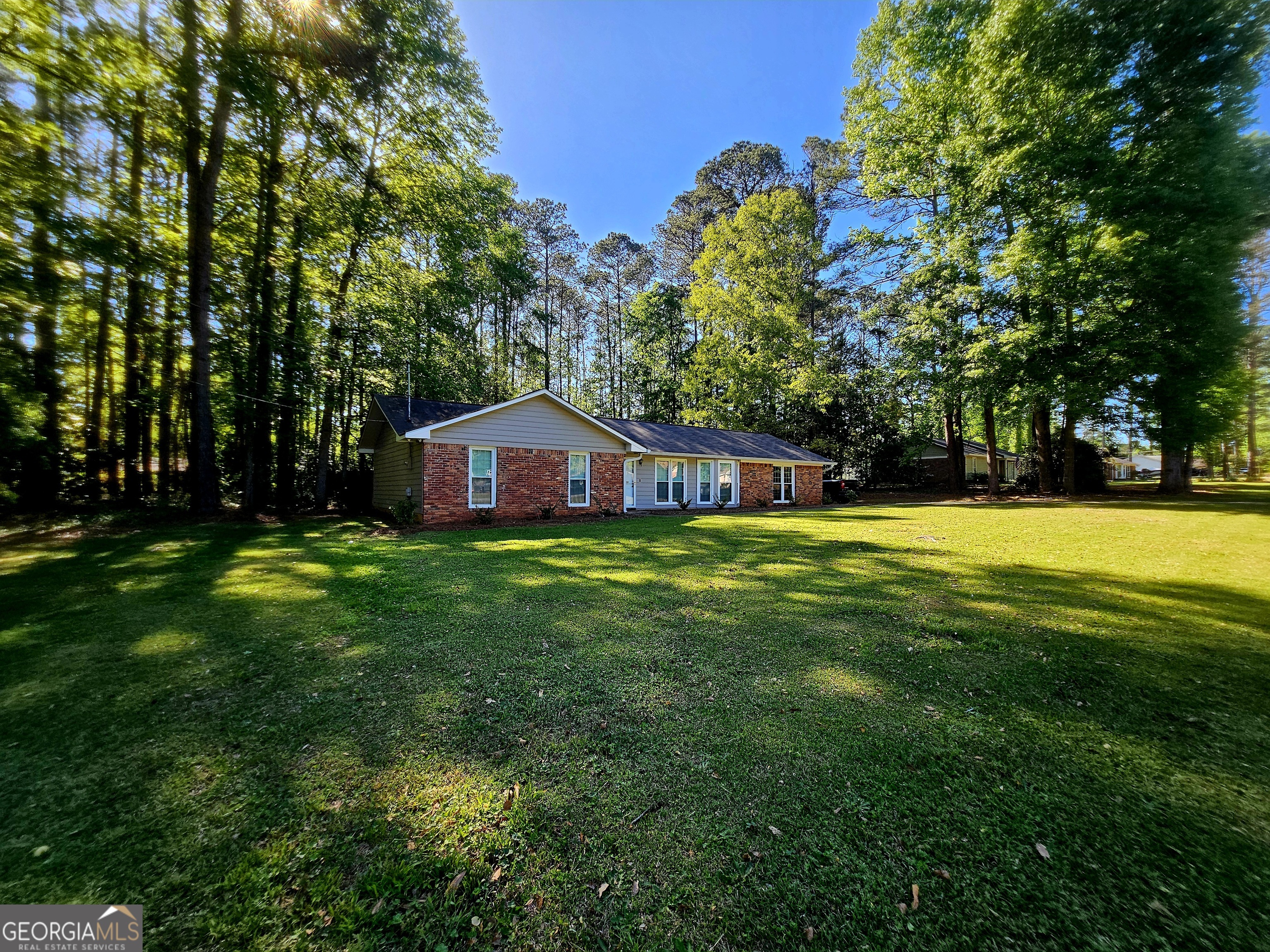 191 Moccasin Trail LaGrange, GA 30241 - Photo 3 of 32 a swimming pool with wooden fence