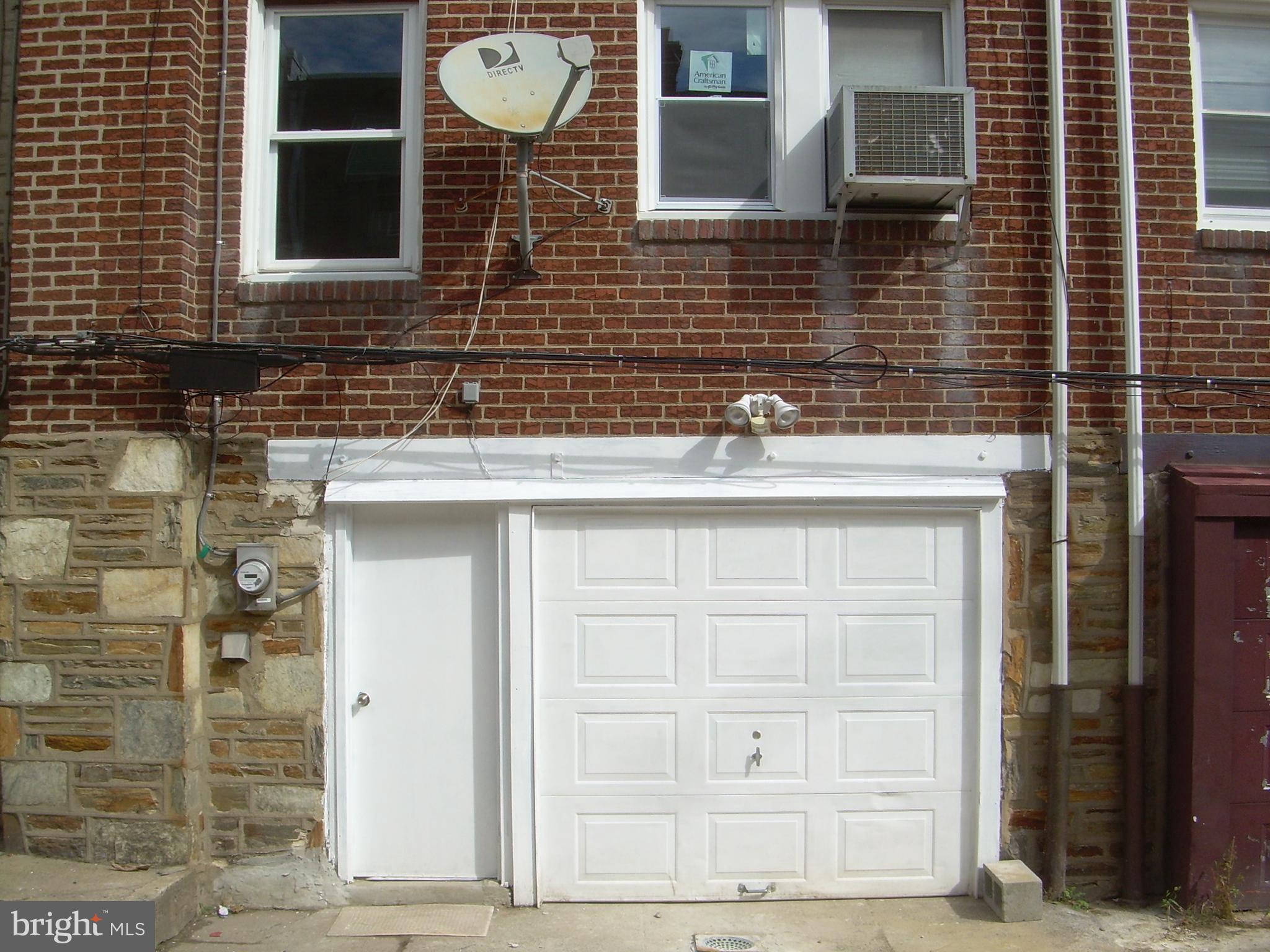 4214 Marple Street Philadelphia, PA 19136 - Photo 39 of 39 a bathroom with a sink and a mirror