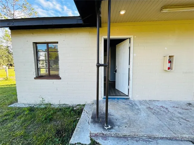 a front door view of a house with a porch