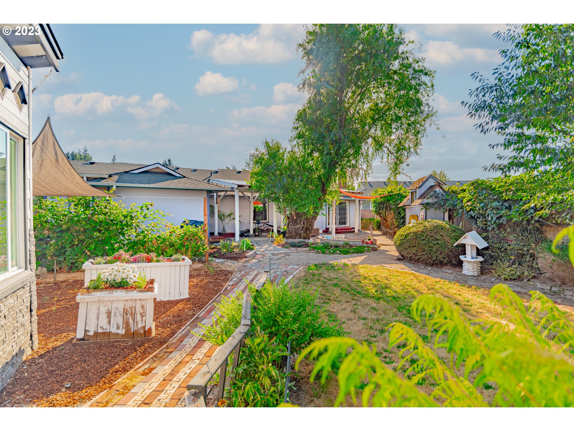 9709 Northwest 19th Avenue Vancouver, WA 98665 - Photo 2 of 27 a view of an house with backyard and sitting area