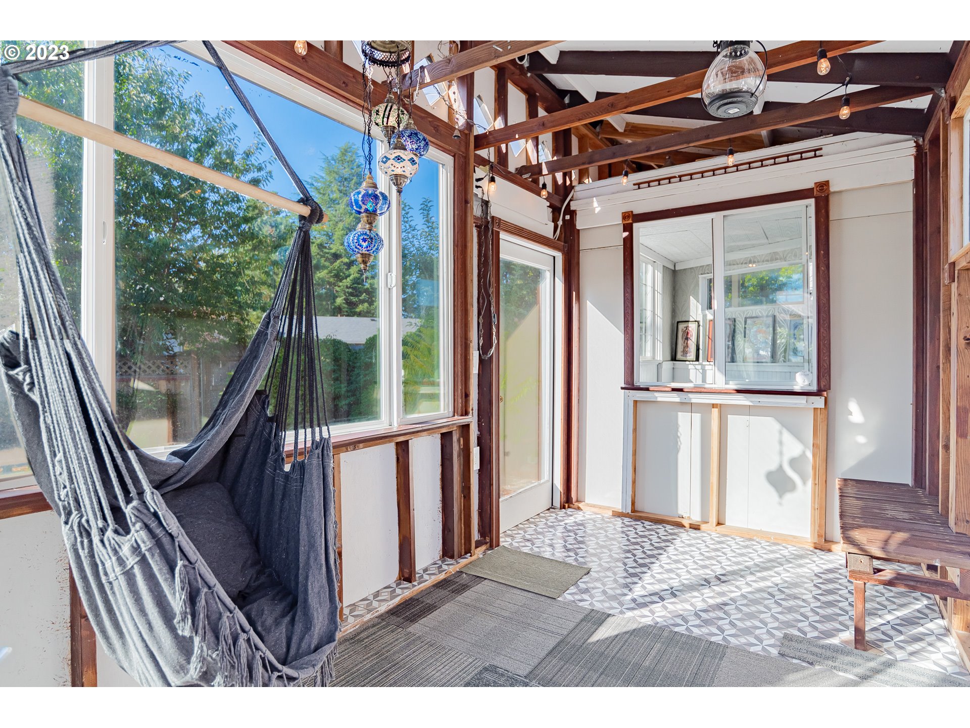 9709 Northwest 19th Avenue Vancouver, WA 98665 - Photo 23 of 27 a view of a porch with furniture and a window