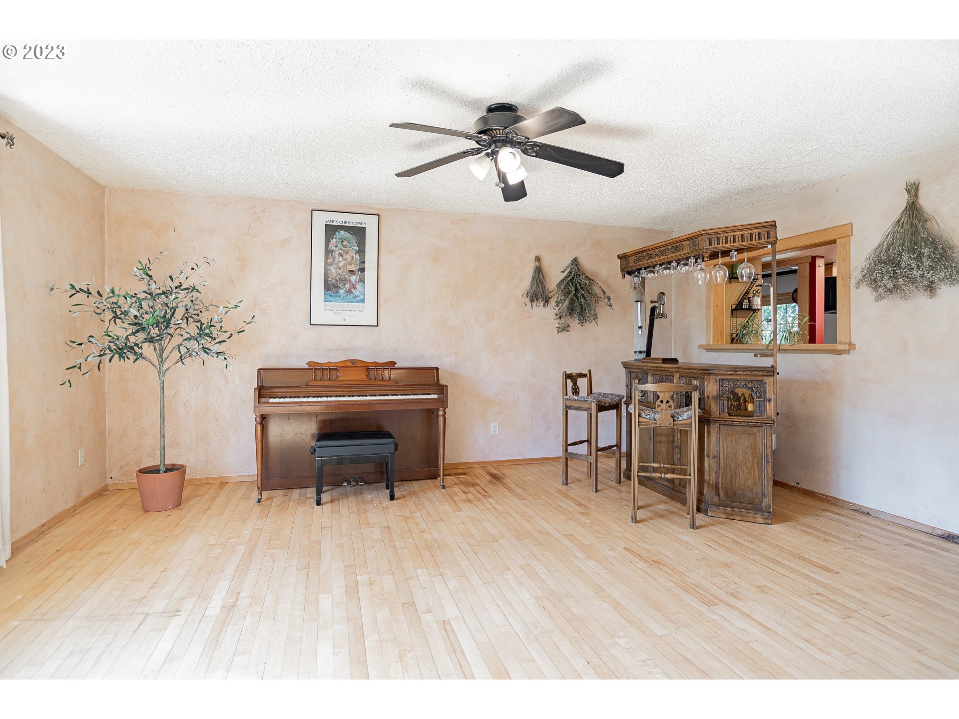 9709 Northwest 19th Avenue Vancouver, WA 98665 - Photo 4 of 27 a living room with furniture and a wooden floor