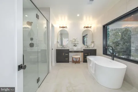 a bedroom with a bed and a lamp