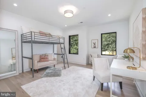 a view of a workspace with furniture