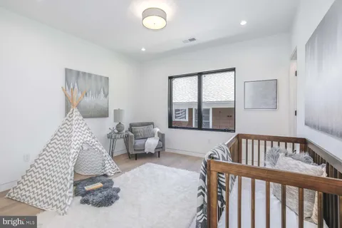 a living room with a couch and a view of living room