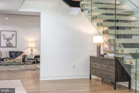 a backyard of a house with outdoor seating