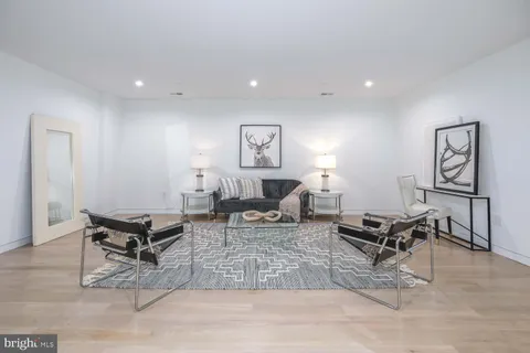 a view of a backyard with sitting area