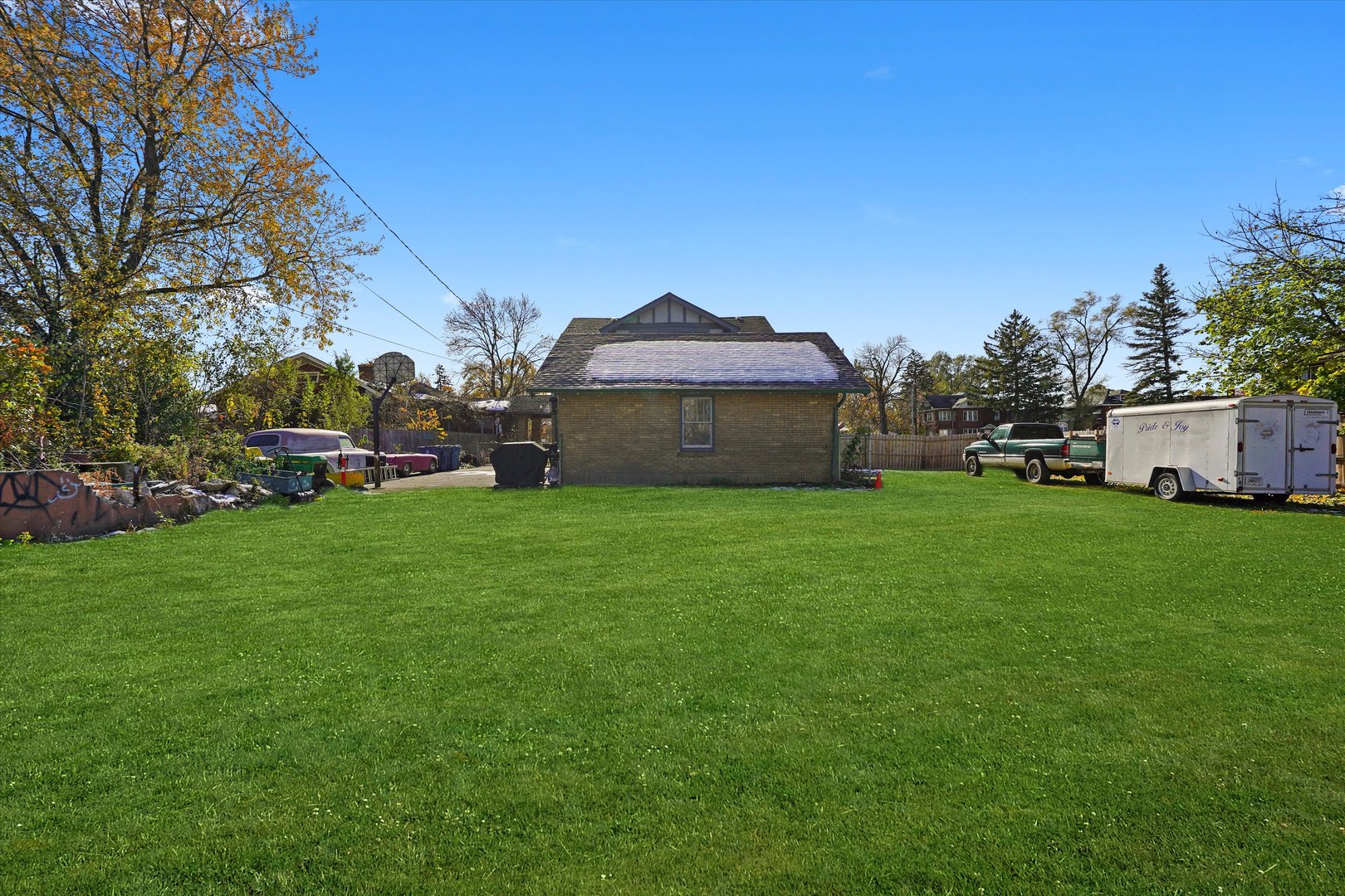 31 East 155th Street Harvey, IL 60426 - Photo 25 of 37 a view of a house with a big yard