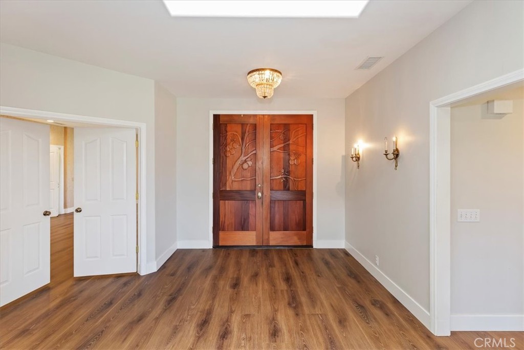 1507 Weston Way Riverside, CA 92506 - Photo 10 of 55 a view of empty room with wooden floor
