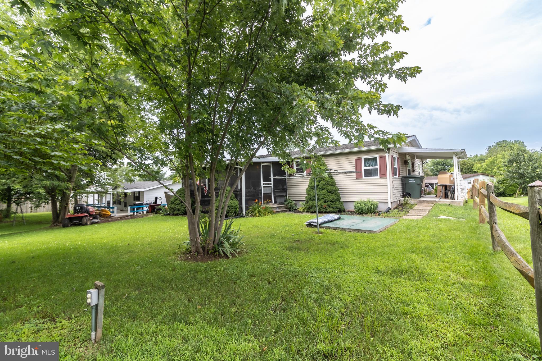 4830 Hikey Street Dover, PA 17315 - Photo 6 of 68 a view of a house with a yard and sitting area