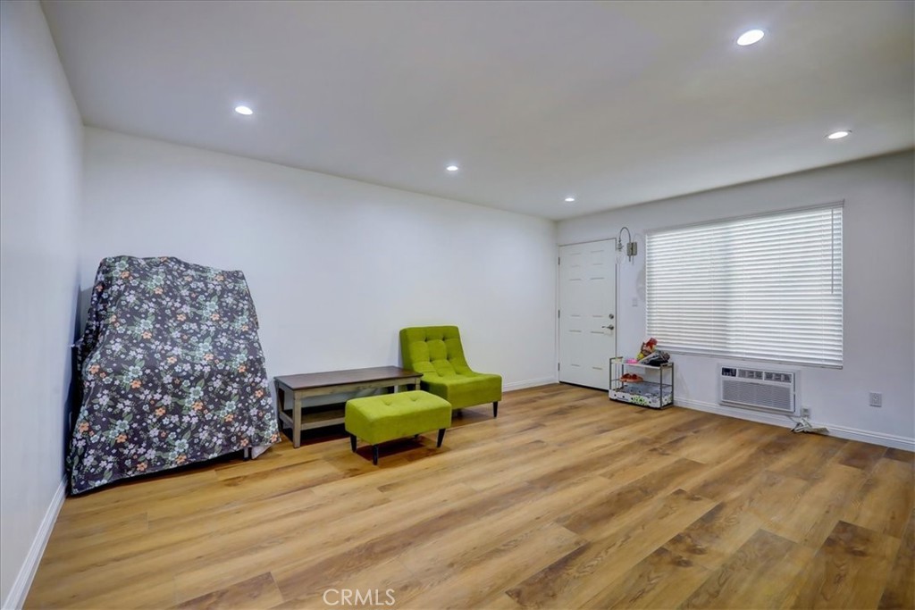 4723 Jackson Street, Unit 25 Riverside, CA 92503 - Photo 8 of 26 a room with a bed and a window