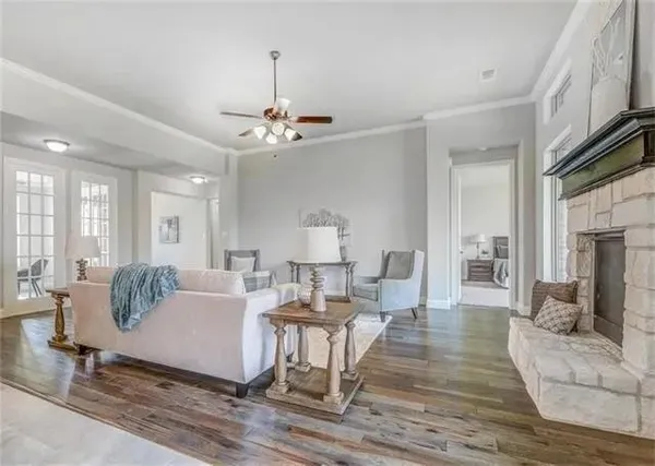 a large kitchen with white cabinets