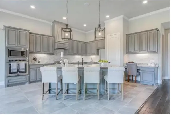 a kitchen with kitchen island granite countertop wooden cabinets and counter space