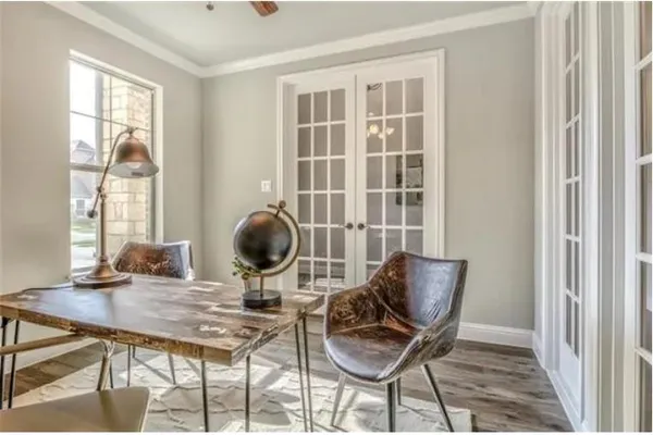 a workspace with furniture and a window