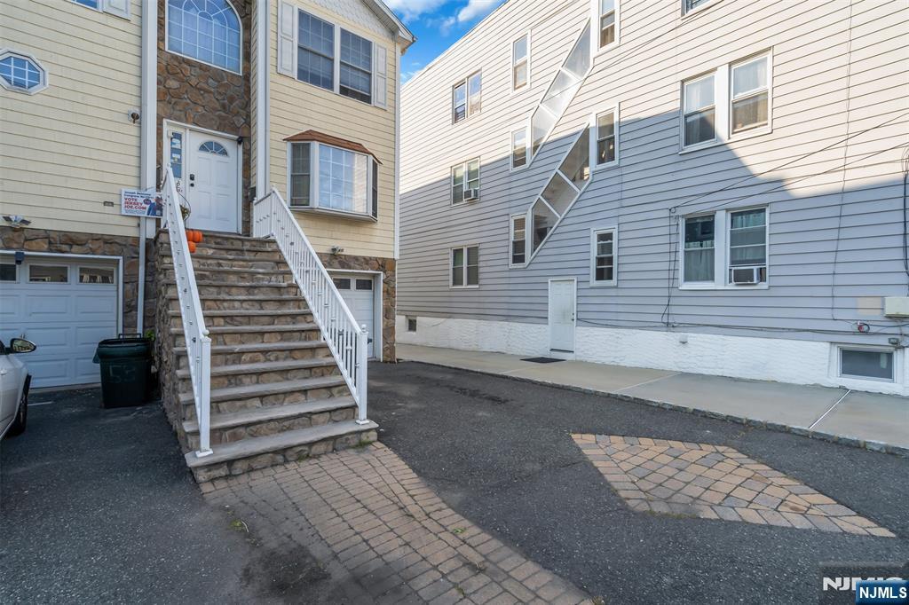 53 Passaic Avenue Nutley, NJ 07110 - Photo 7 of 42 a view of a house with a stairs
