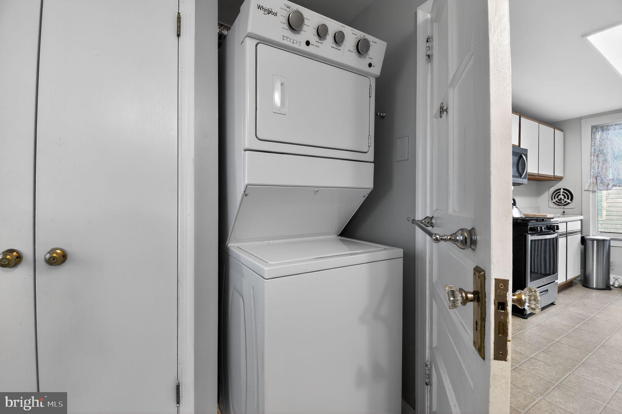4041 7th Street North Beach, MD 20714 - Photo 19 of 35 a utility room with dryer and washer