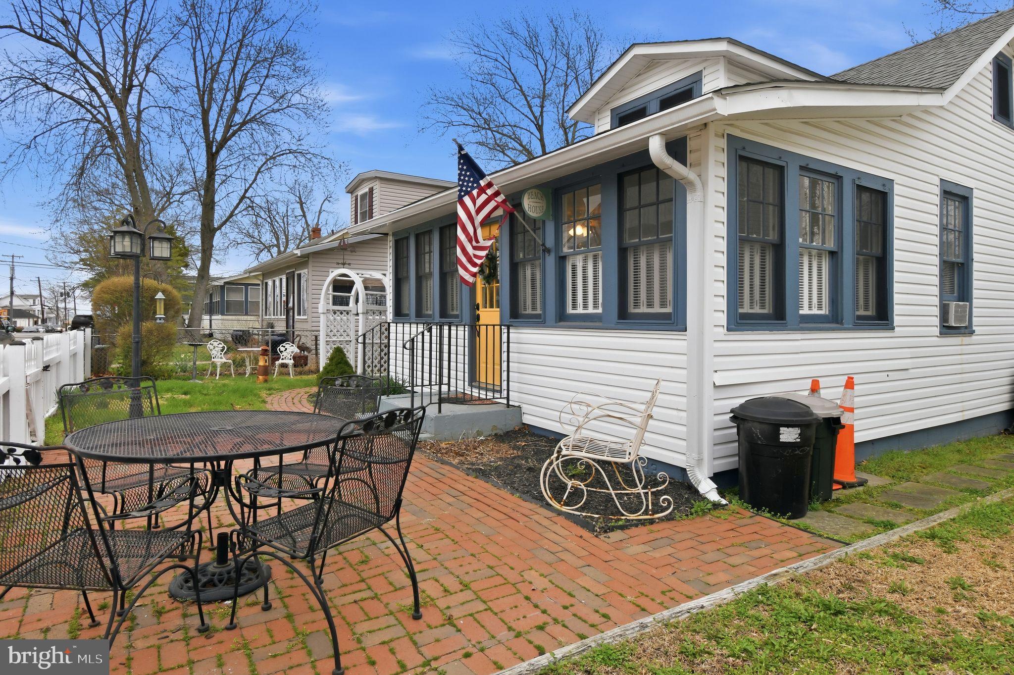 4041 7th Street North Beach, MD 20714 - Photo 24 of 35 a view of a house with backyard and sitting area