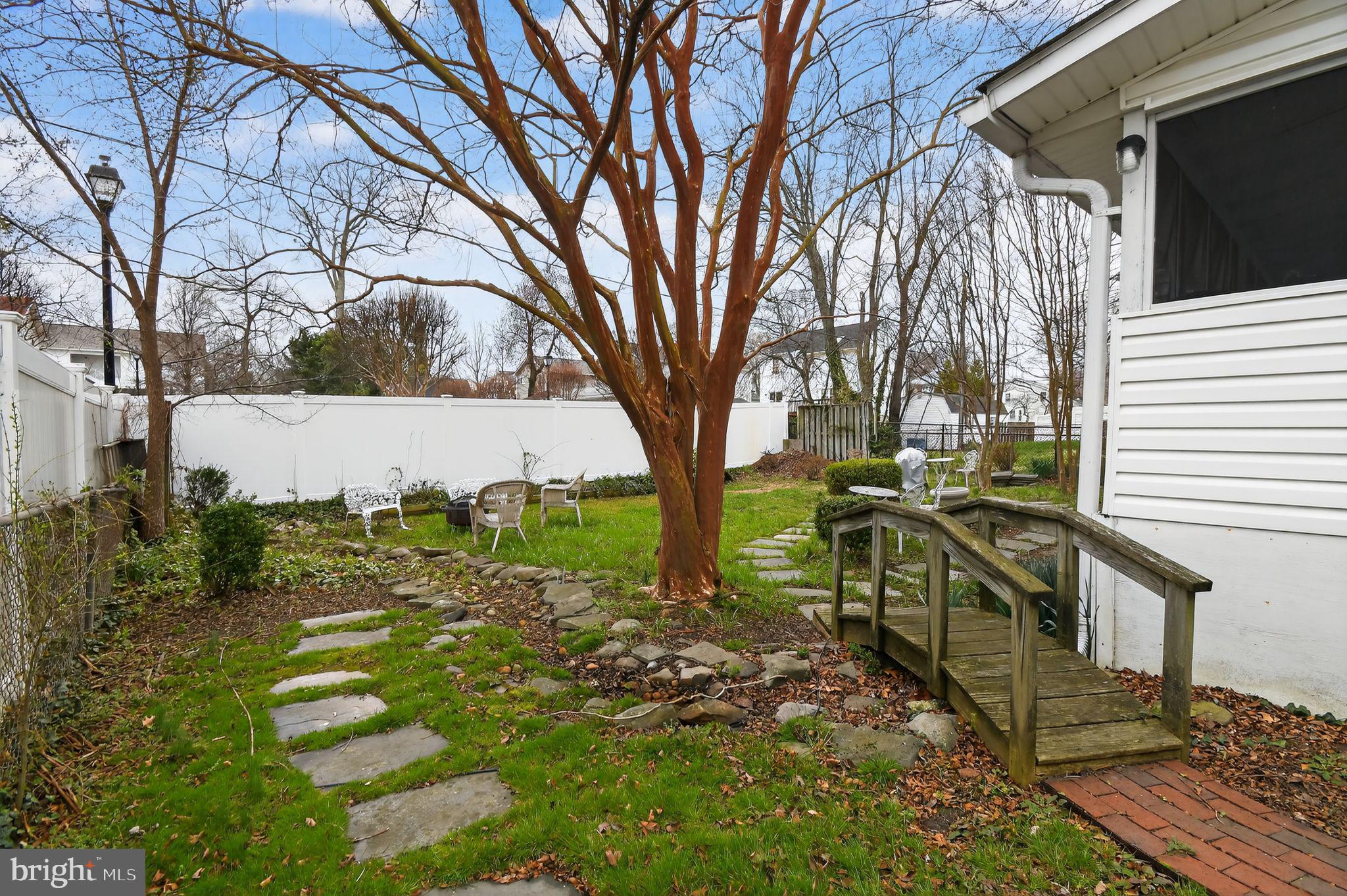 4041 7th Street North Beach, MD 20714 - Photo 29 of 35 a view of outdoor space and garden