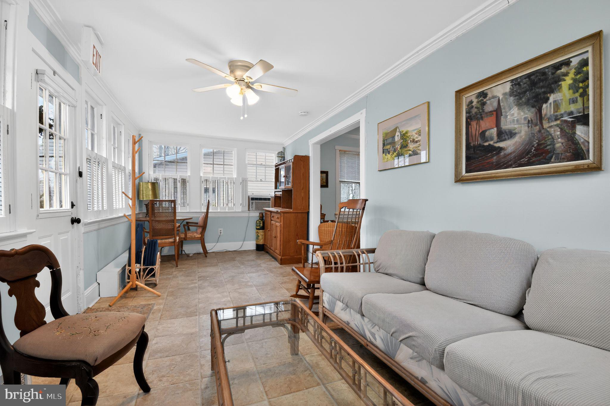 4041 7th Street North Beach, MD 20714 - Photo 5 of 35 a living room with furniture and wooden floor