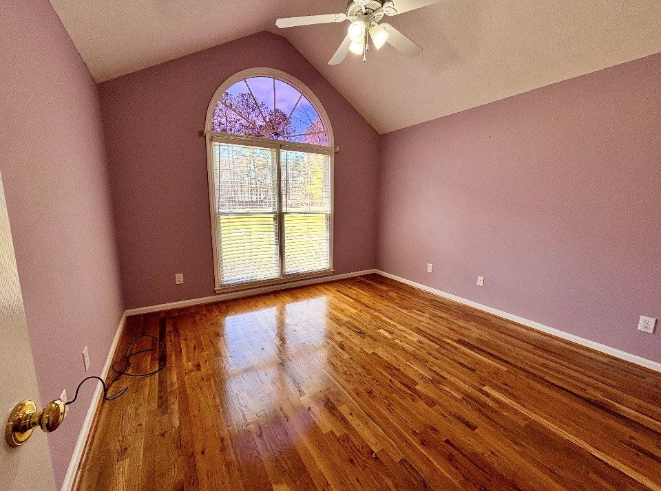 205 Morton Court Fortson, GA 31808 - Photo 16 of 23 wooden floor in an empty room with a window