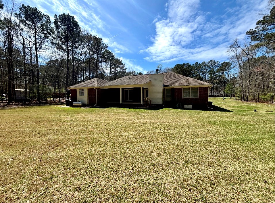 205 Morton Court Fortson, GA 31808 - Photo 22 of 23 a view of a house with a yard