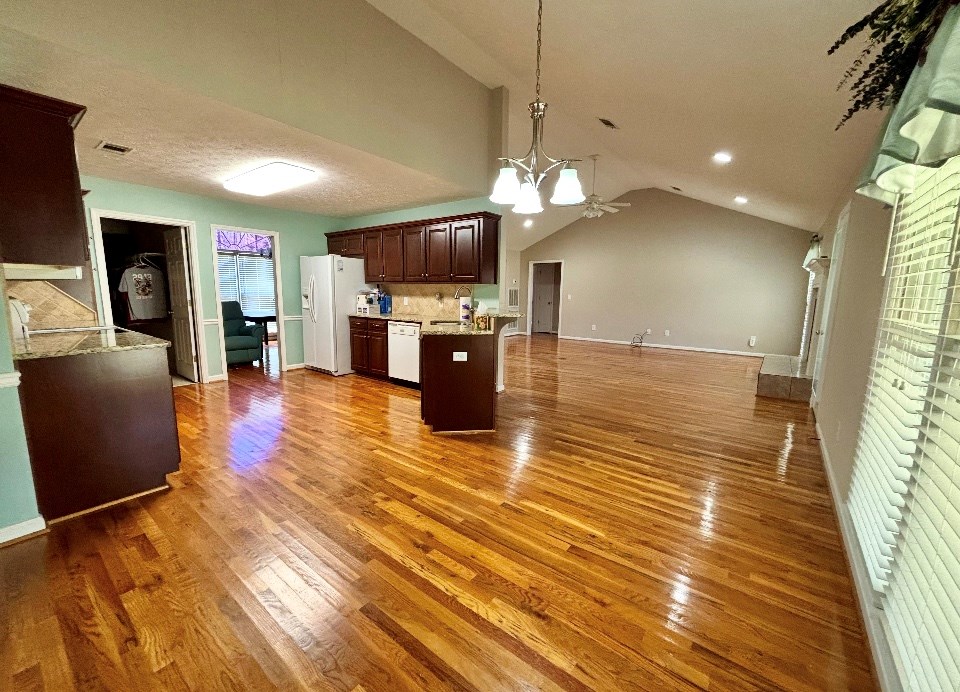 205 Morton Court Fortson, GA 31808 - Photo 7 of 23 a view of a living room a flat screen tv and kitchen view