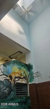 a bathroom with a shower and toilet