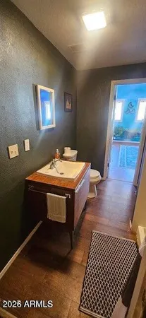 a room with furniture pool table and window