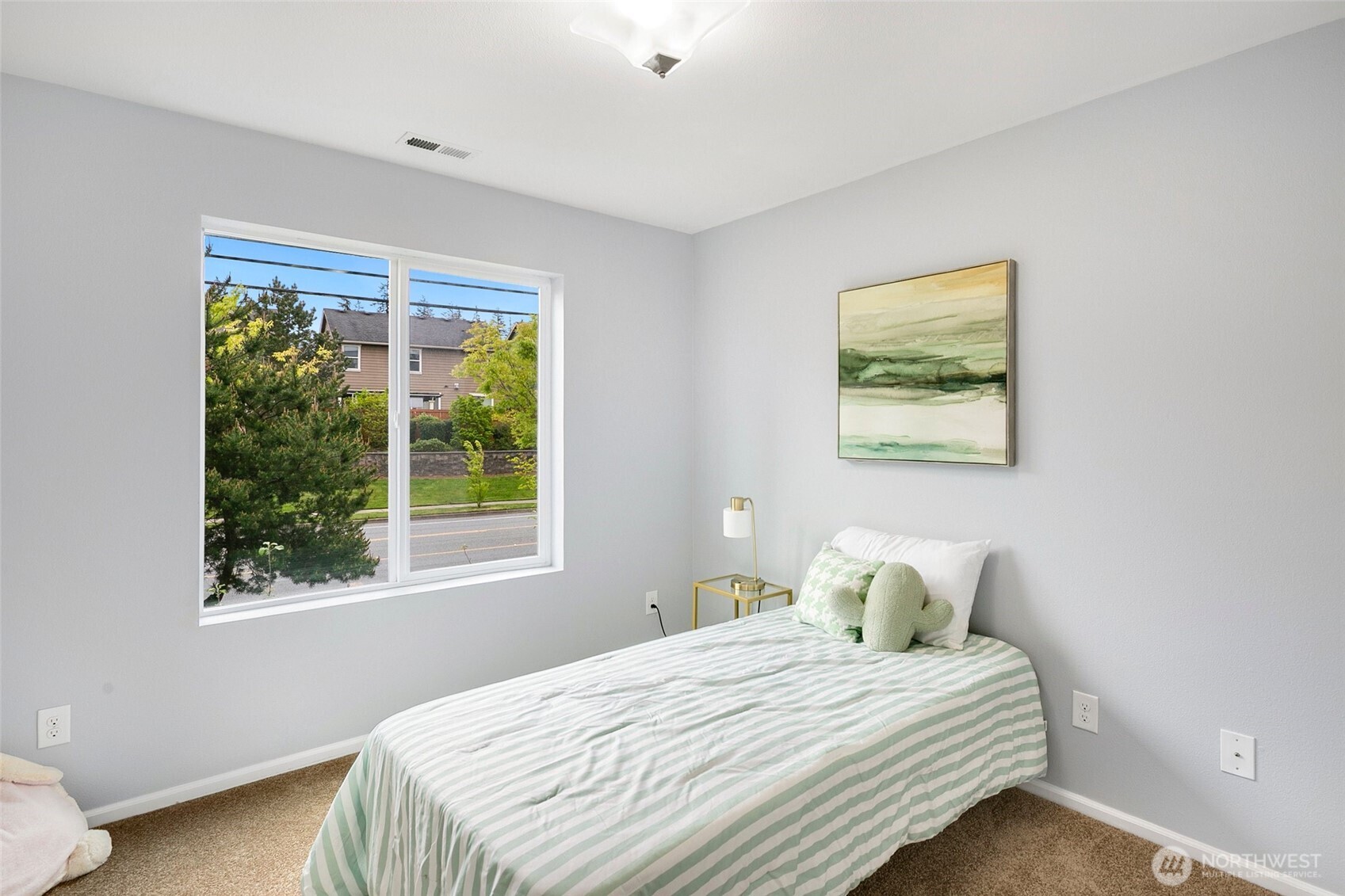3931 177th Street Southeast Bothell, WA 98012 - Photo 27 of 39 a bedroom with a bed and a window
