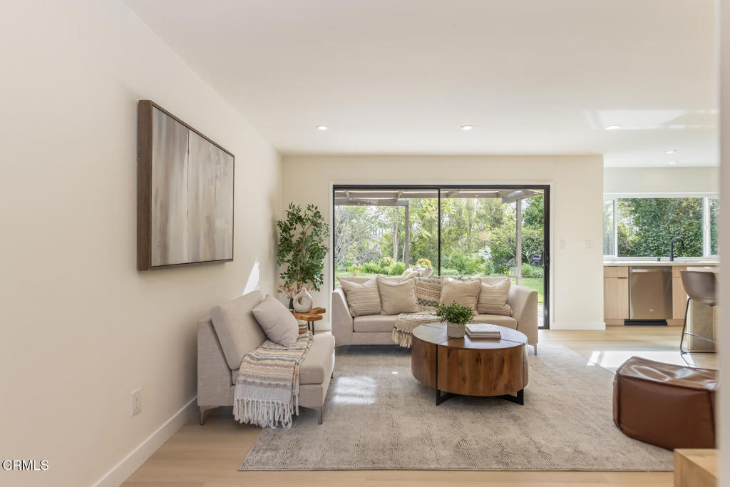 11772 Monte Leon Way Porter Ranch, CA 91326 - Photo 18 of 58 a living room with furniture and a large window