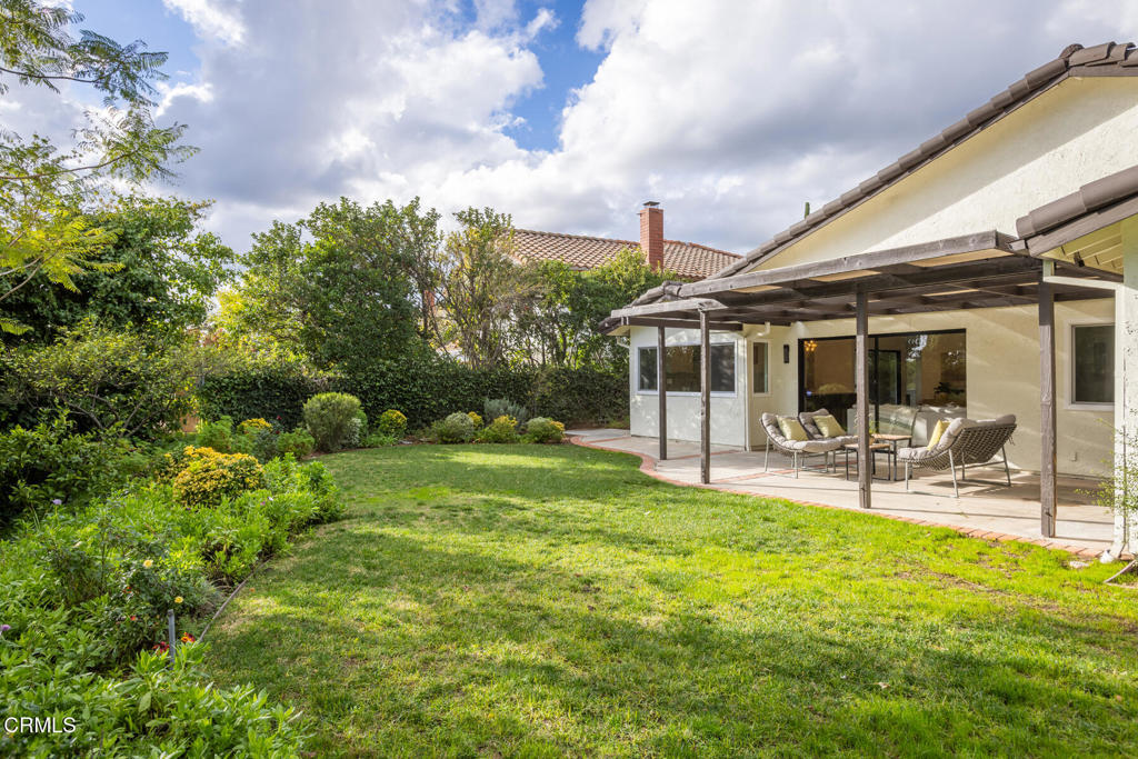 11772 Monte Leon Way Porter Ranch, CA 91326 - Photo 53 of 58 a view of house with backyard and patio