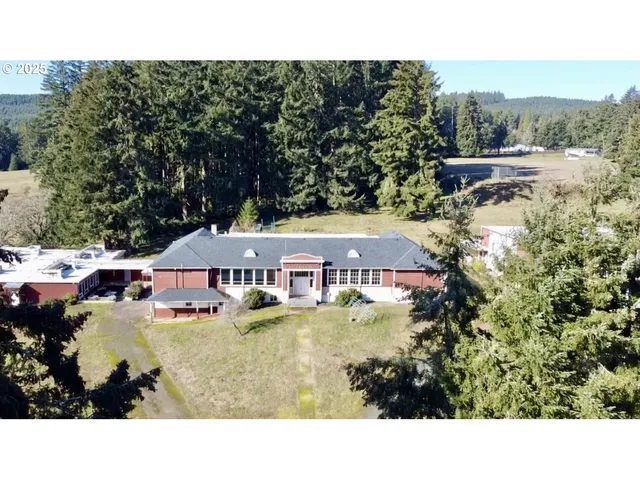 a front view of a house with yard
