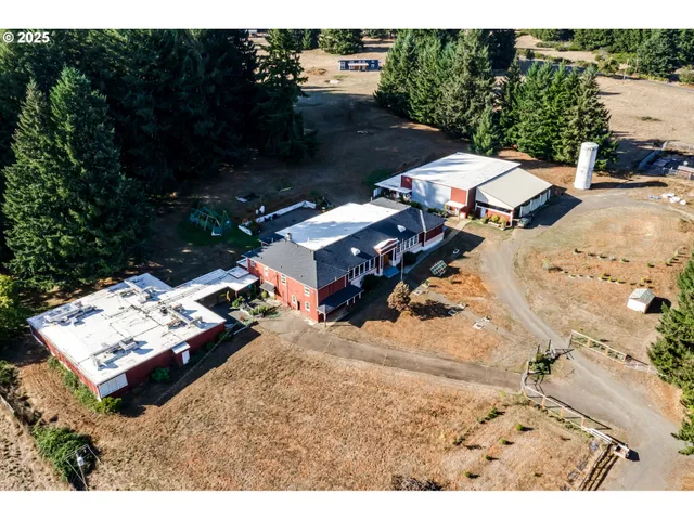 a view of backyard of house with outdoor seating