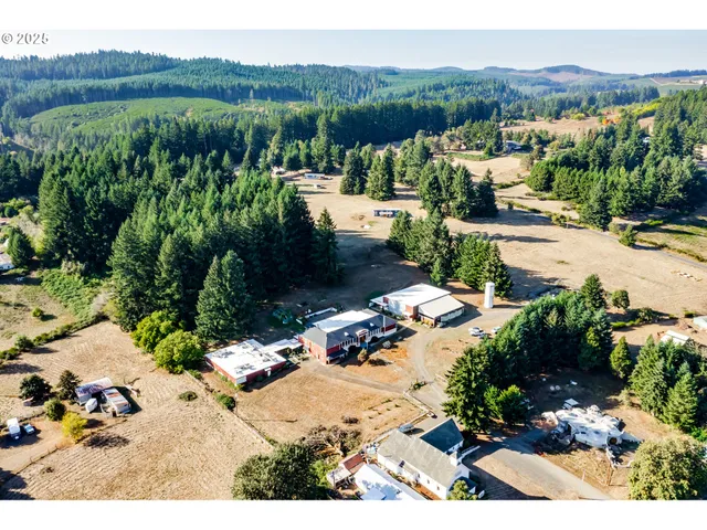 a view of yard with patio