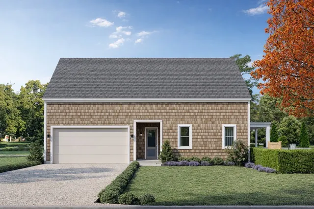 front view of a house with a yard